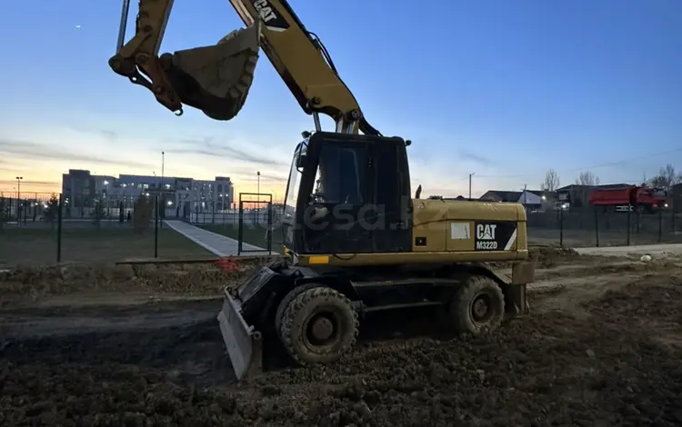 Caterpillar  M322 2012 года за 40 000 000 тг. в Астана