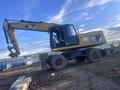 Caterpillar  M322 2012 года за 40 000 000 тг. в Астана