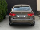 Kia Cerato 2012 года за 2 950 000 тг. в Шымкент – фото 5