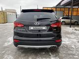 Hyundai Santa Fe 2013 года за 8 700 000 тг. в Кызылорда – фото 2