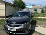 Toyota Camry 2014 года за 7 850 000 тг. в Актобе – фото 4