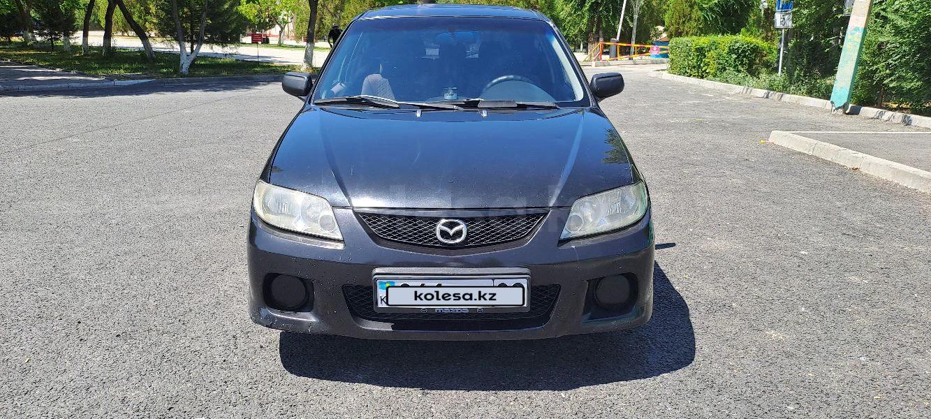 Mazda 323 2002 г.