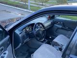 Mazda 323 2002 года за 2 700 000 тг. в Актобе – фото 2