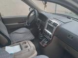 Kia Carnival 2000 года за 2 000 000 тг. в Шымкент – фото 5