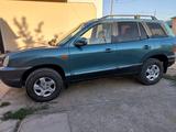 Hyundai Santa Fe 2001 года за 3 300 000 тг. в Шолаккорган – фото 4