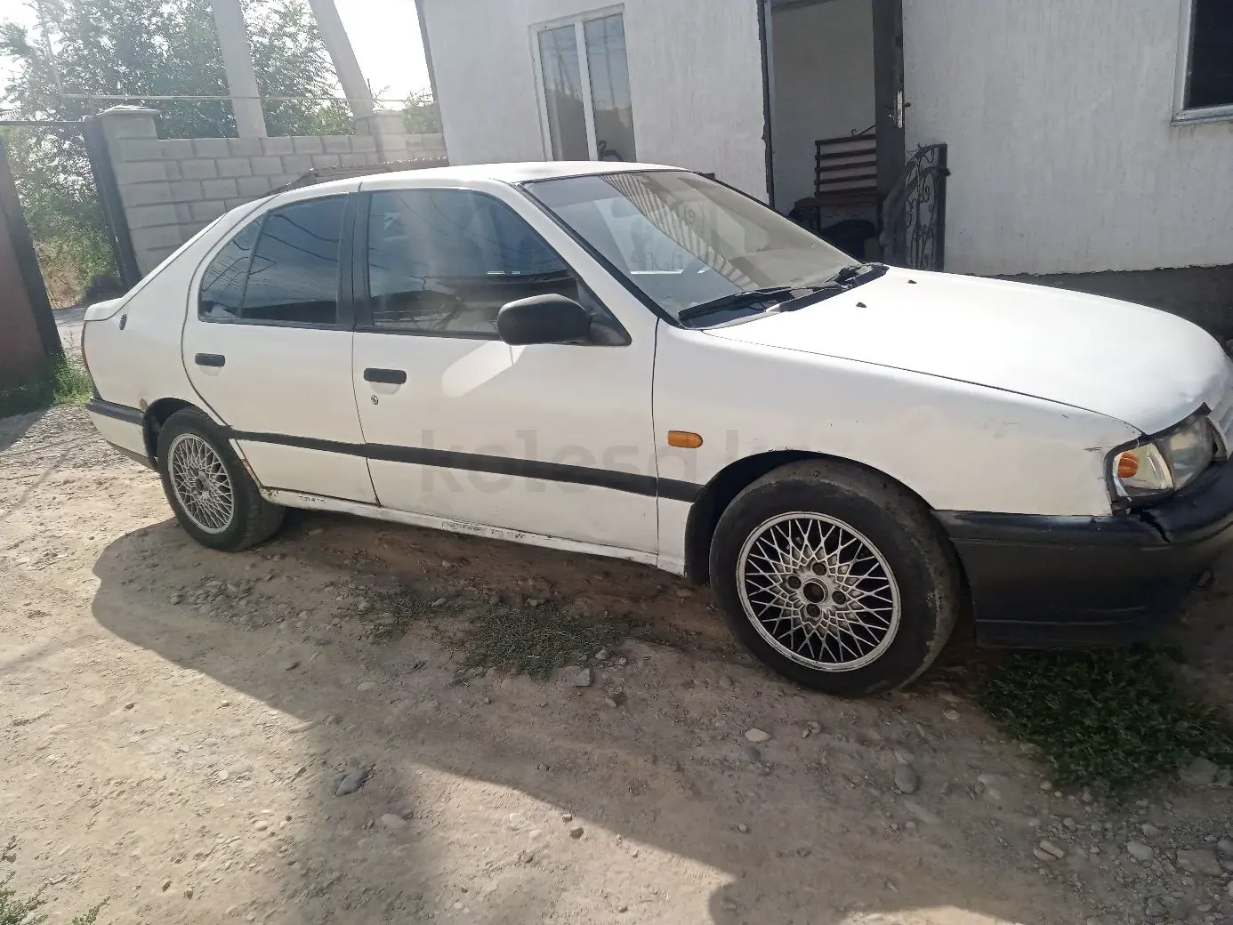 Nissan Primera, 1990