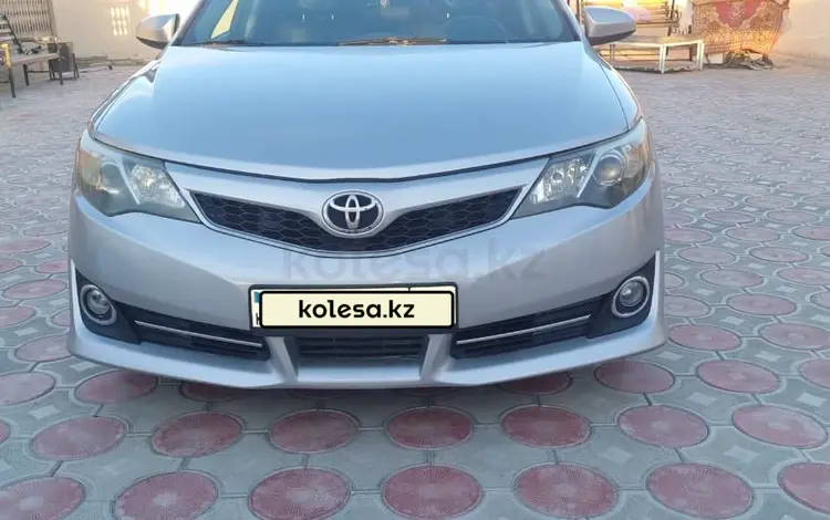 Toyota Camry 2013 года за 8 840 080 тг. в Жанаозен