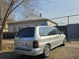 Kia Carnival 2005 годаfor2 800 000 тг. в Шымкент – фото 3