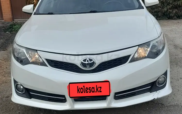 Toyota Camry 2014 года за 6 600 000 тг. в Атырау