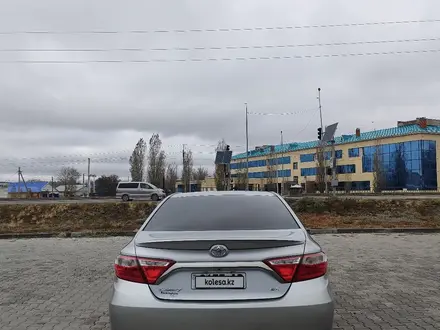 Toyota Camry 2015 года за 6 500 000 тг. в Актобе – фото 7