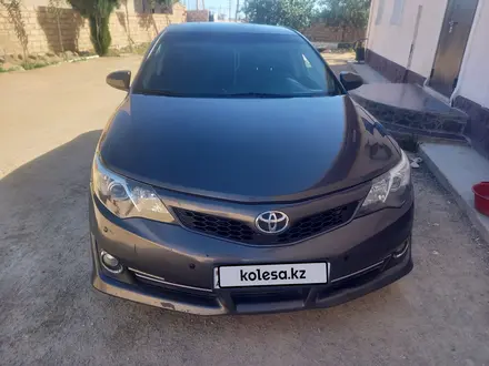 Toyota Camry 2013 года за 6 000 000 тг. в Жанаозен