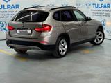 BMW X1 2012 года за 6 100 000 тг. в Алматы – фото 4