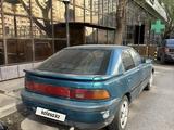 Mazda 323 1993 года за 700 000 тг. в Астана – фото 5