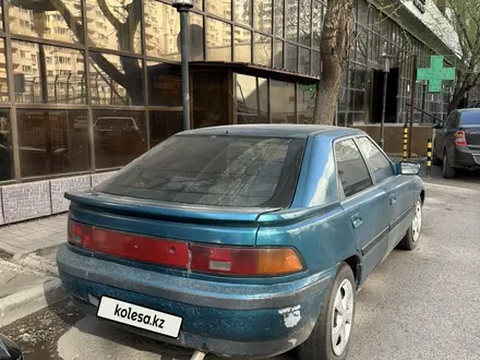Mazda 323 1993 года за 600 000 тг. в Астана – фото 5