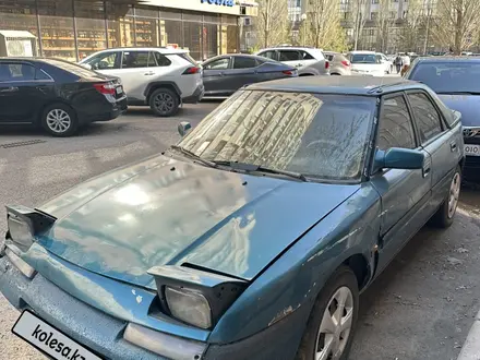 Mazda 323 1993 года за 600 000 тг. в Астана – фото 9