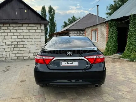 Toyota Camry 2015 года за 7 000 000 тг. в Актобе – фото 12