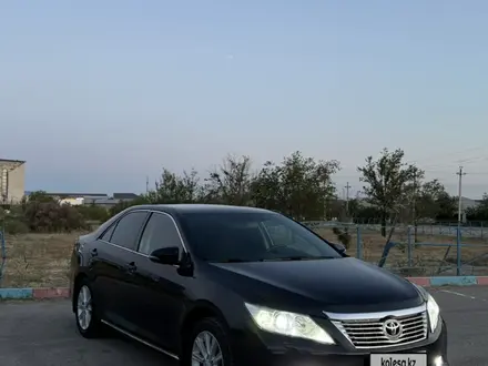 Toyota Camry 2013 года за 8 500 000 тг. в Жанаозен