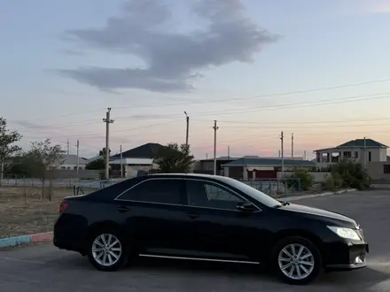 Toyota Camry 2013 года за 8 500 000 тг. в Жанаозен – фото 2