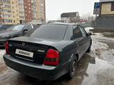 Mazda 323 1999 года за 1 750 000 тг. в Астана – фото 2