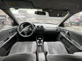 Mazda 323 1999 года за 1 750 000 тг. в Астана – фото 3