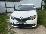 Renault Logan 2014 года за 2 650 000 тг. в Уральск – фото 2