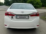 Toyota Corolla 2014 годаүшін7 600 000 тг. в Караганда – фото 2