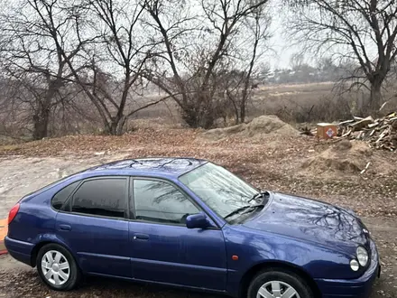 Toyota Corolla 2000 года за 2 350 000 тг. в Алматы – фото 24