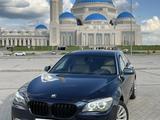 BMW 750 2011 года за 11 000 000 тг. в Астана