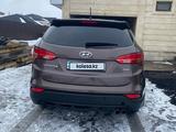 Hyundai Santa Fe 2015 года за 8 400 000 тг. в Астана – фото 2