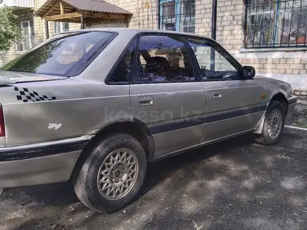 Mazda 626 1992 года за 1 100 000 тг. в Актобе – фото 2