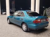 Mazda 323 1998 года за 1 950 000 тг. в Туркестан – фото 4