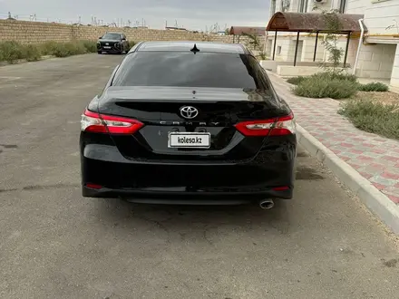 Toyota Camry 2018 года за 8 500 000 тг. в Жанаозен – фото 6