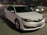 Toyota Camry 2014 года за 8 400 000 тг. в Жанаозен – фото 5