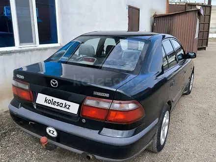 Mazda 626 1998 года за 1 650 000 тг. в Актобе – фото 3