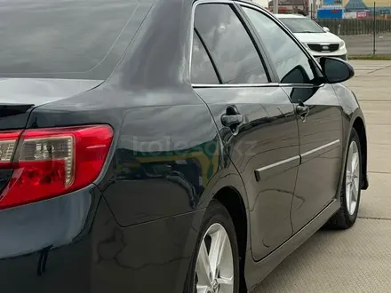 Toyota Camry 2014 года за 5 980 000 тг. в Уральск – фото 35