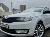 Skoda Rapid 2014 года за 6 300 000 тг. в Астана