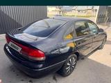 Mazda Cronos 1995 годаүшін900 000 тг. в Шымкент – фото 4