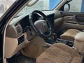 Toyota Land Cruiser 2001 года за 7 400 000 тг. в Актау – фото 7
