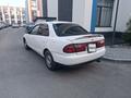 Mazda 323 1997 года за 1 200 000 тг. в Алматы – фото 4
