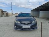 Toyota Camry 2012 года за 8 200 000 тг. в Жанаозен – фото 4