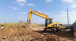 Caterpillar  318 2004 года за 18 000 000 тг. в Житикара