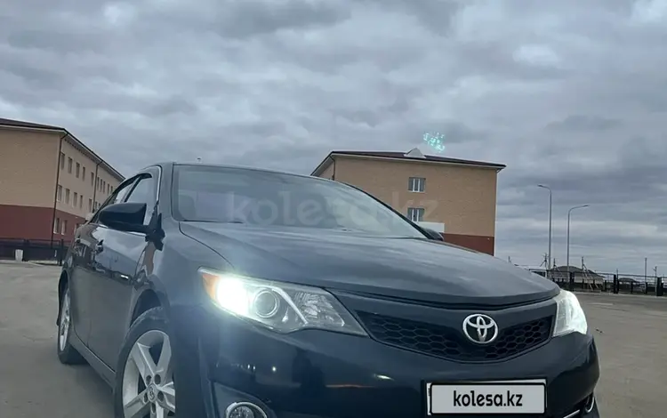 Toyota Camry 2013 года за 5 800 000 тг. в Атырау