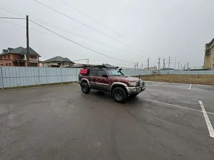 Nissan Patrol 2004 года за 9 500 000 тг. в Алматы – фото 7
