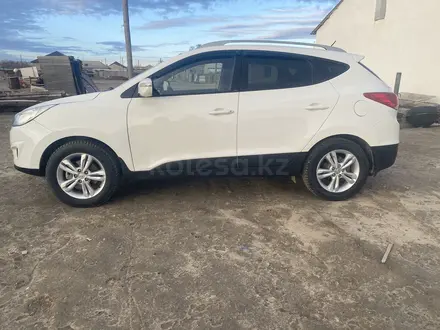 Hyundai Tucson 2013 года за 7 000 000 тг. в Атырау – фото 9