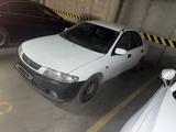 Mazda 323 1997 года за 850 000 тг. в Астана – фото 2