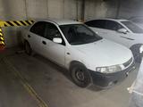 Mazda 323 1997 года за 850 000 тг. в Астана