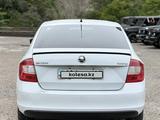 Skoda Rapid 2014 годаүшін4 400 000 тг. в Алматы – фото 4
