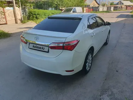 Toyota Corolla 2015 года за 6 600 000 тг. в Алматы – фото 4