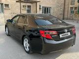 Toyota Camry 2014 года за 8 200 000 тг. в Жанаозен – фото 4