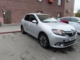 Renault Logan 2014 года за 2 300 000 тг. в Астана – фото 2
